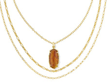 Load image into Gallery viewer, Kendra Scott Elle Bamboo Frame Triple Necklace in Gold Marbled Amber Illusion