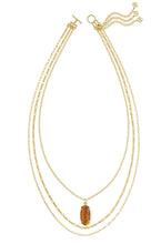 Load image into Gallery viewer, Kendra Scott Elle Bamboo Frame Triple Necklace in Gold Marbled Amber Illusion