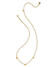 Load image into Gallery viewer, Kendra Scott Mini Elisa Vintage Gold Three Stone Necklace in Marbled Amber Illusion
