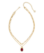 Load image into Gallery viewer, Kendra Scott Daphne Bow Gold Multi Strand Necklace in Dark Burgundy Illusion
